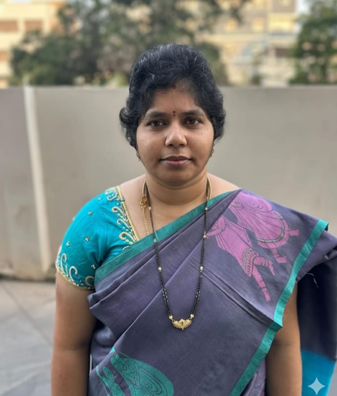 Dr. Pramodini, Professor